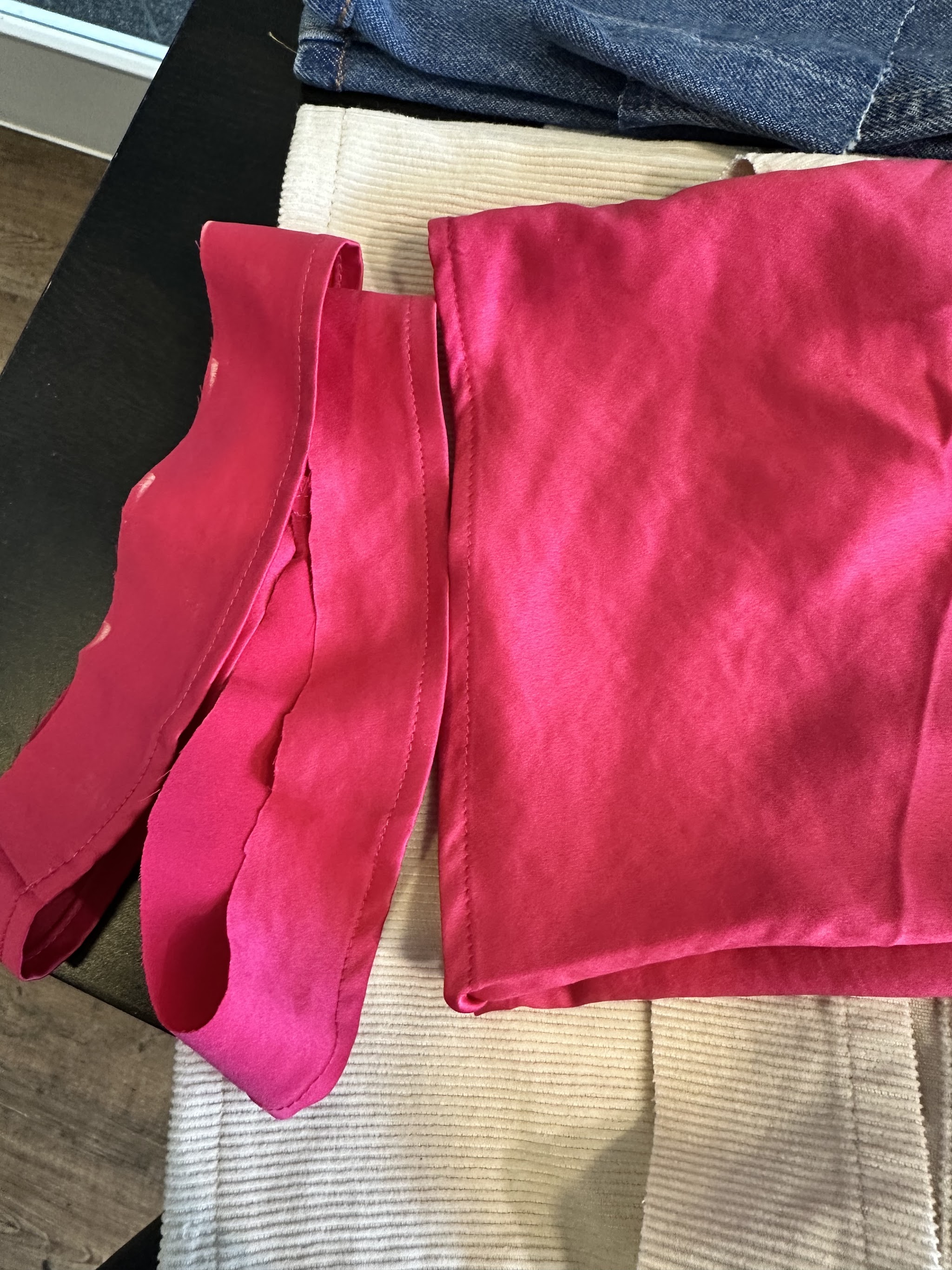 Pink fabric with visible sewing detail